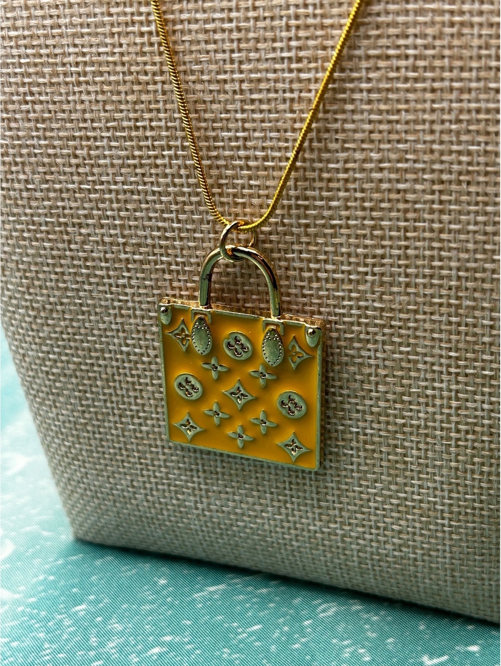 Louis Vuitton gold and yellow shopping bag necklace 24 inch gold chain new
